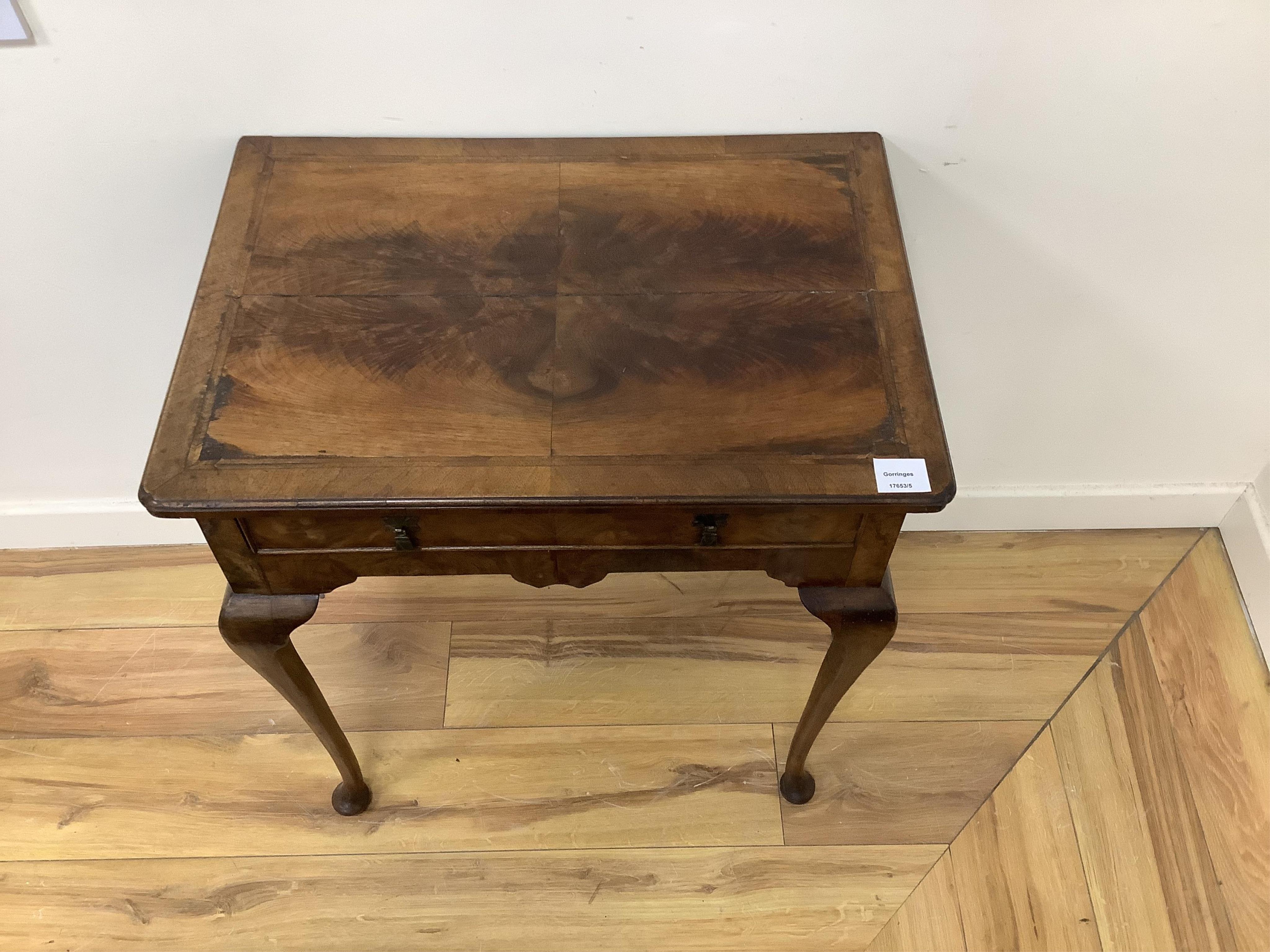 A George I style feather banded walnut side table, width 63cm, depth 44cm, height 71cm. Condition - fair